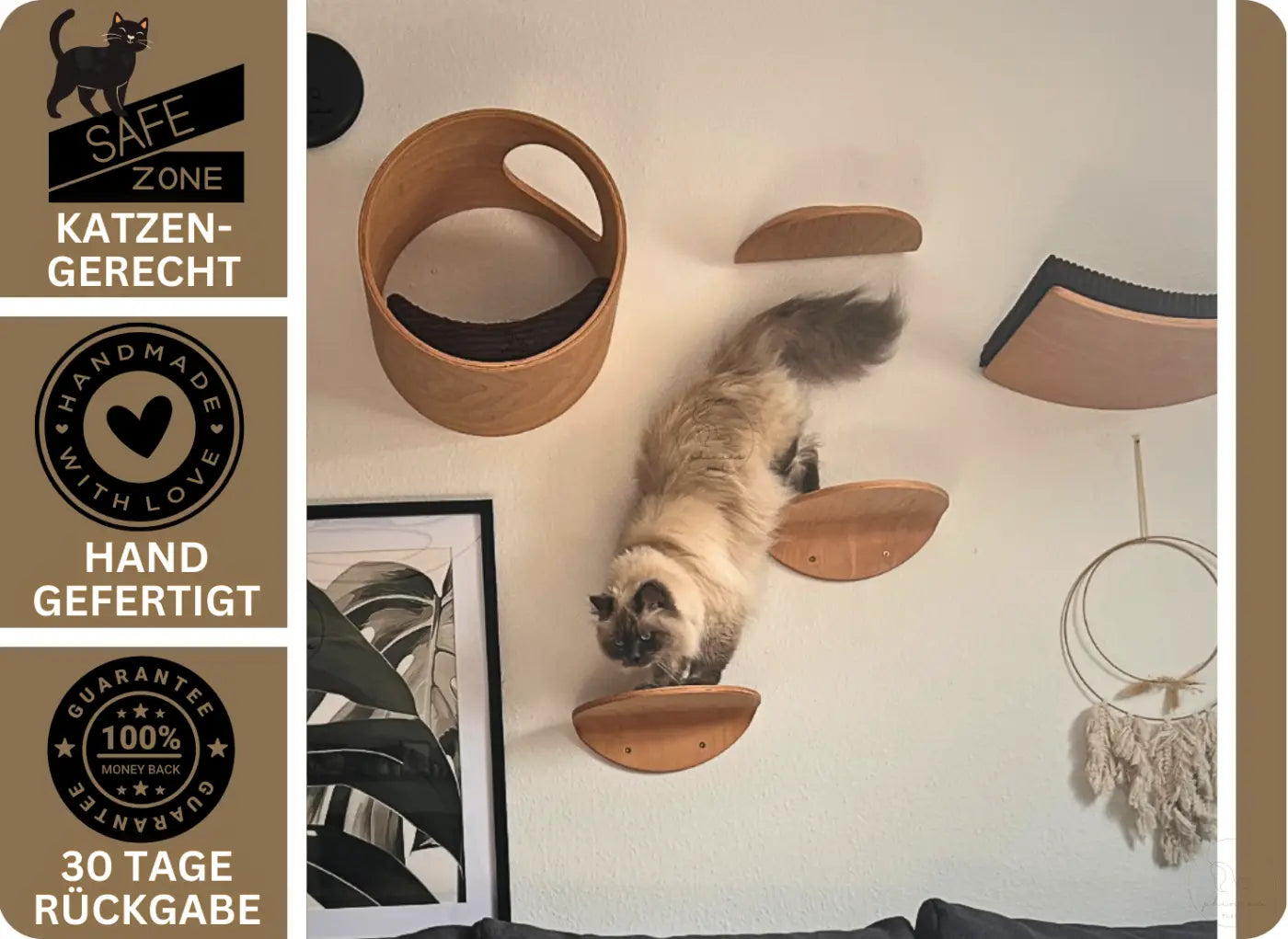 Katze klettert an Wandmöbel mit Phinias runder Katzenliege und mondförmigem Kissen